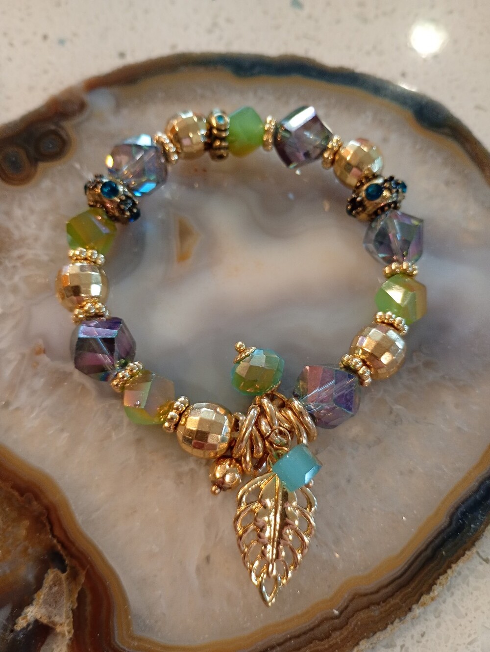 Gold Leaf Charm Stretch Bracelet with Green + Purple Crystal Beads